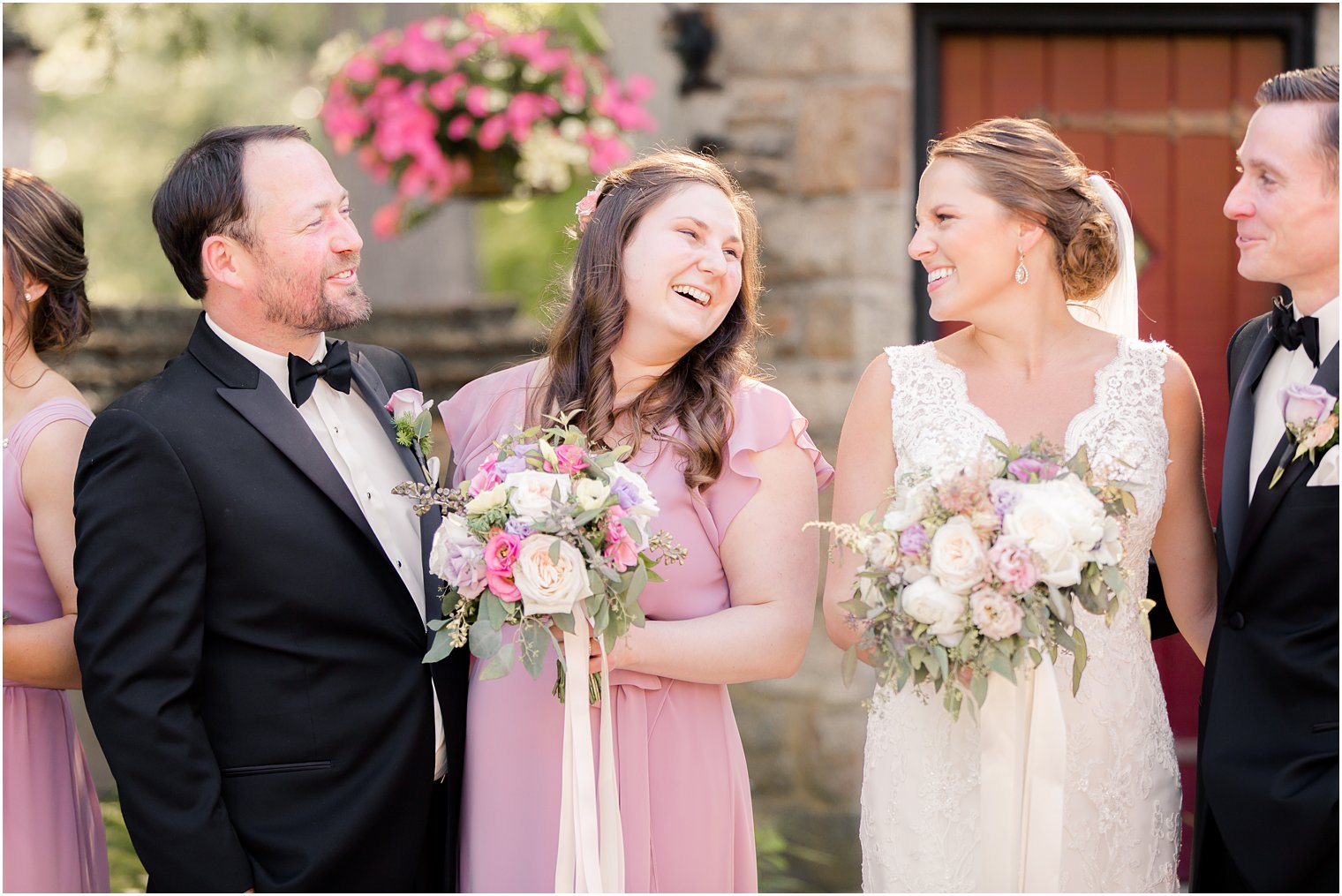 Candid photo between bridal party members