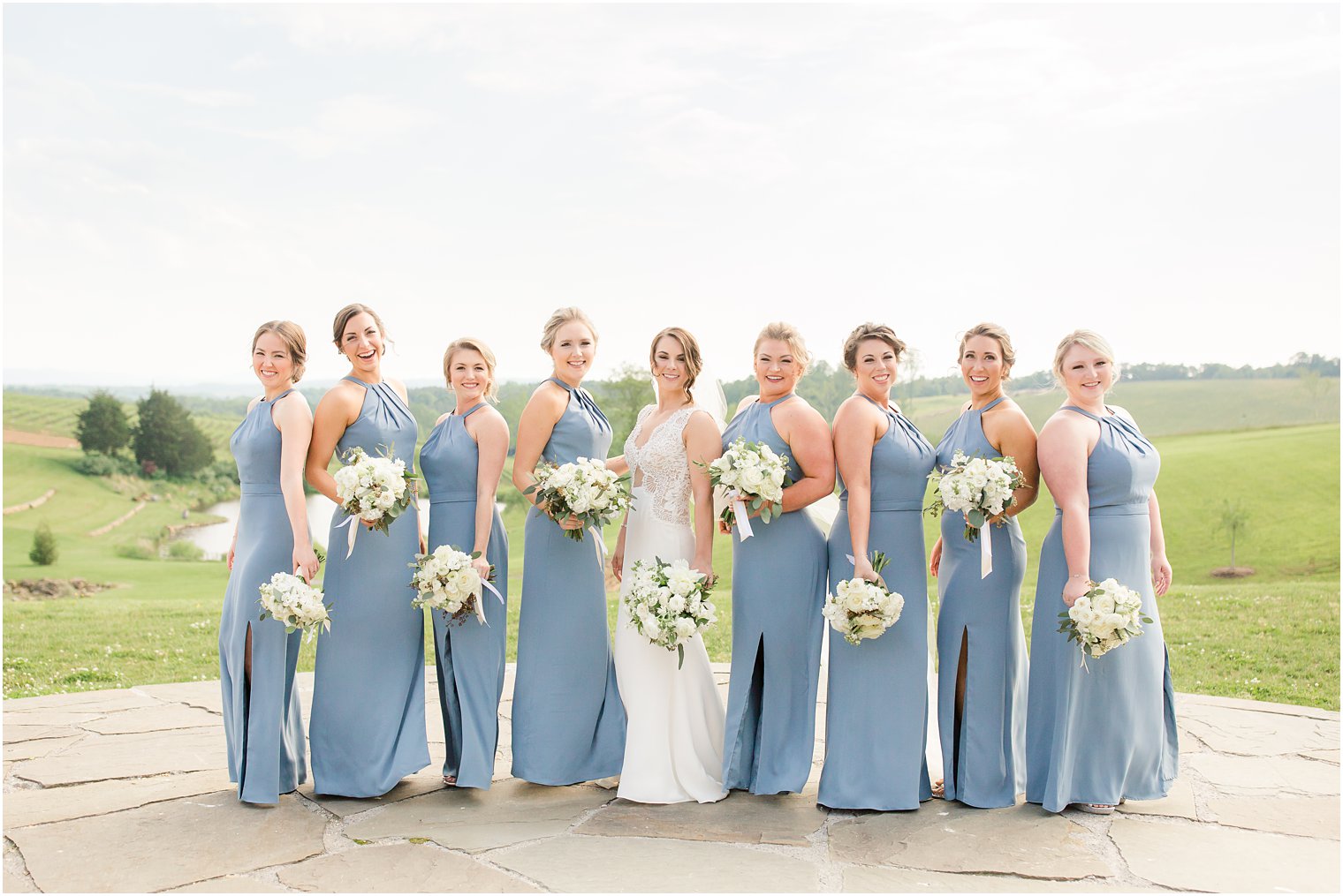 Bridesmaids wearing blue at Stone Tower Winery Wedding