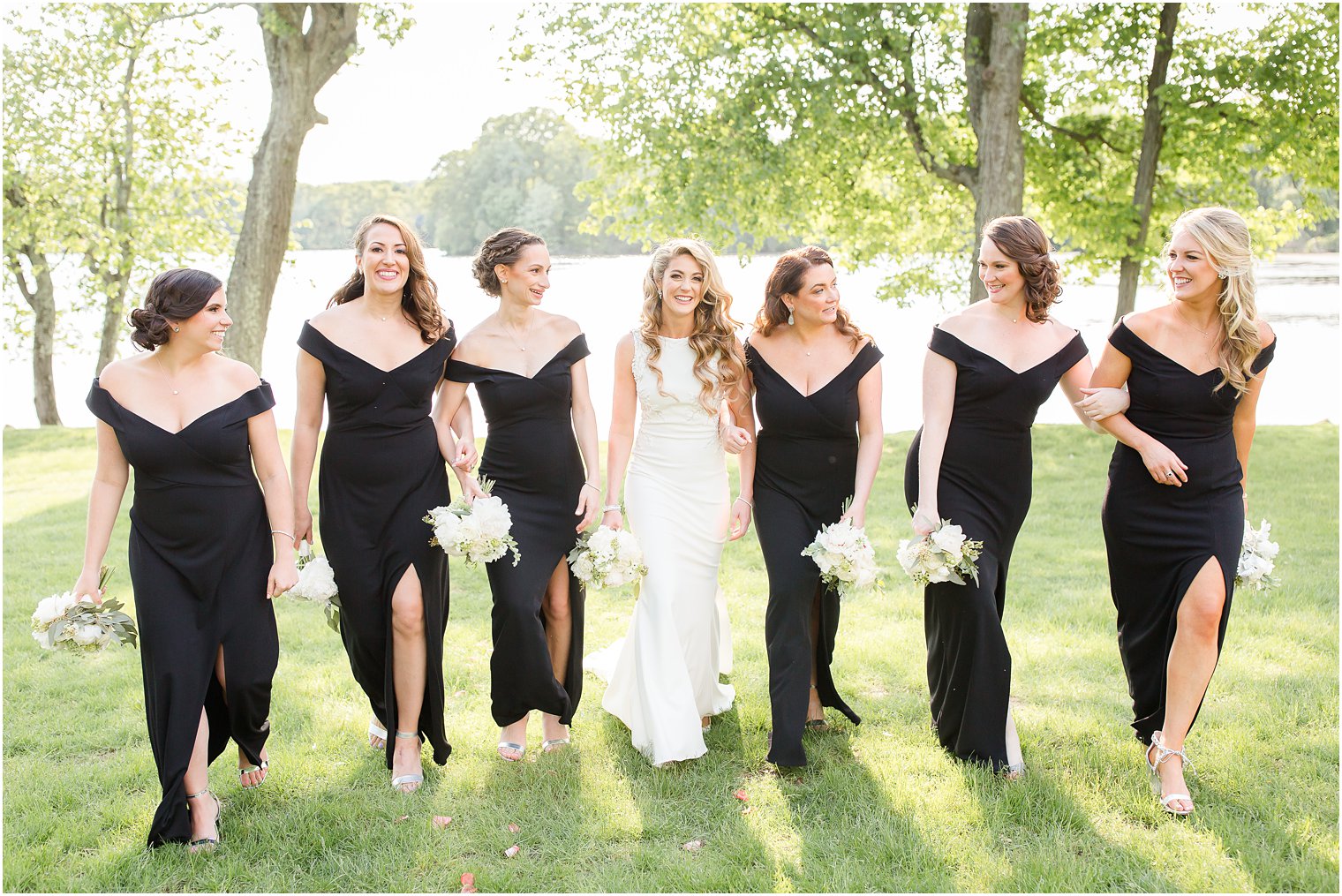 Candid photo of bride walking with her bridesmaids