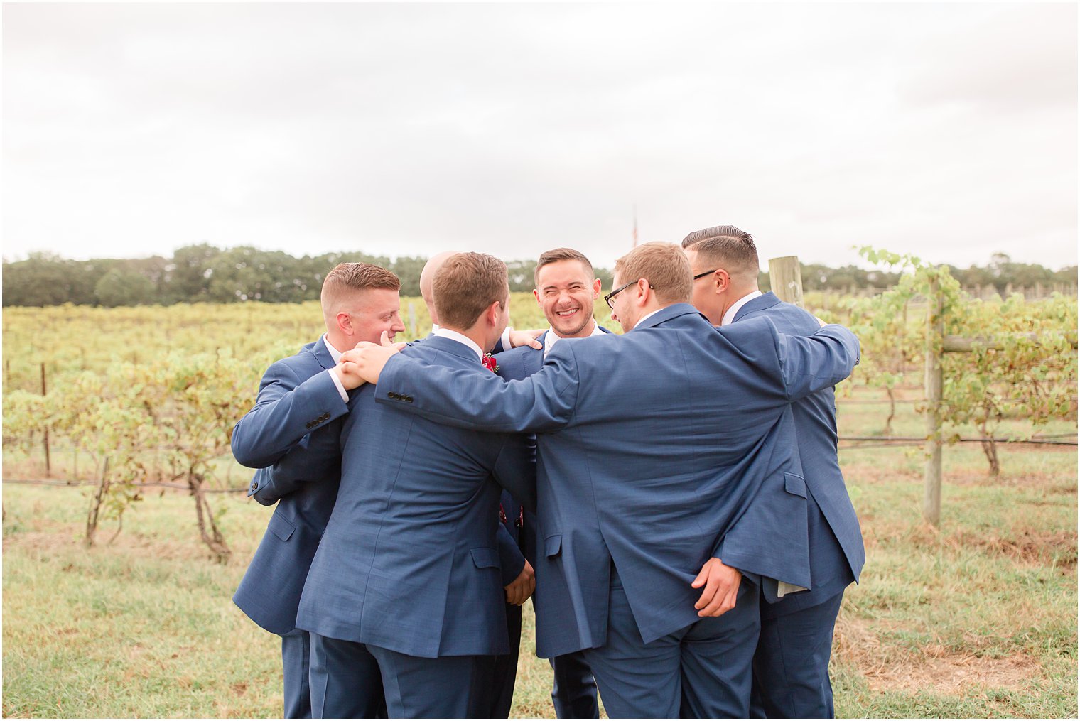 Groomsmen huddle