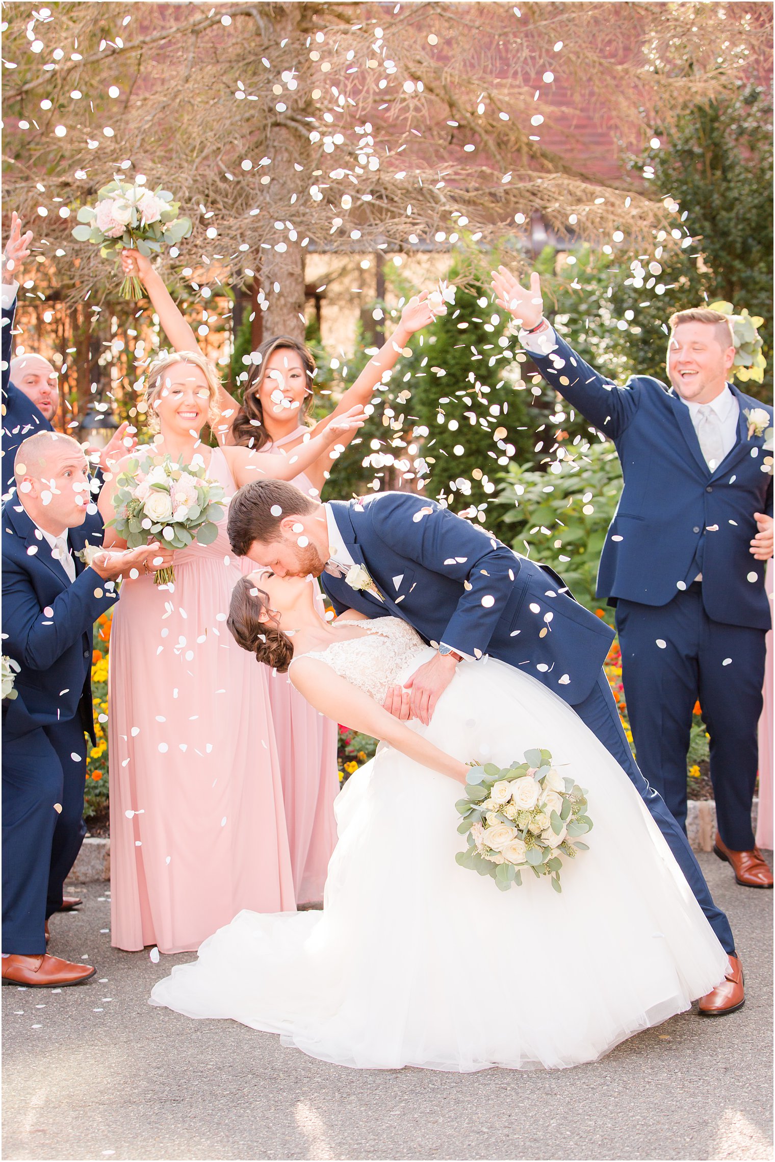Bridal party and confetti poppers