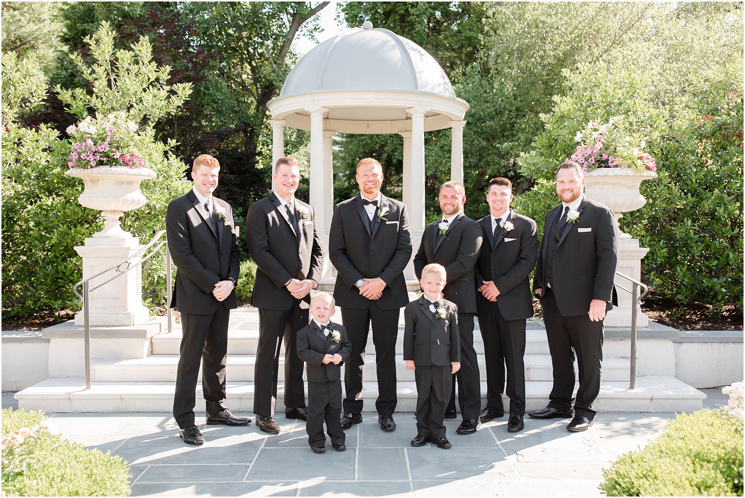 Groomsmen in black tuxedos