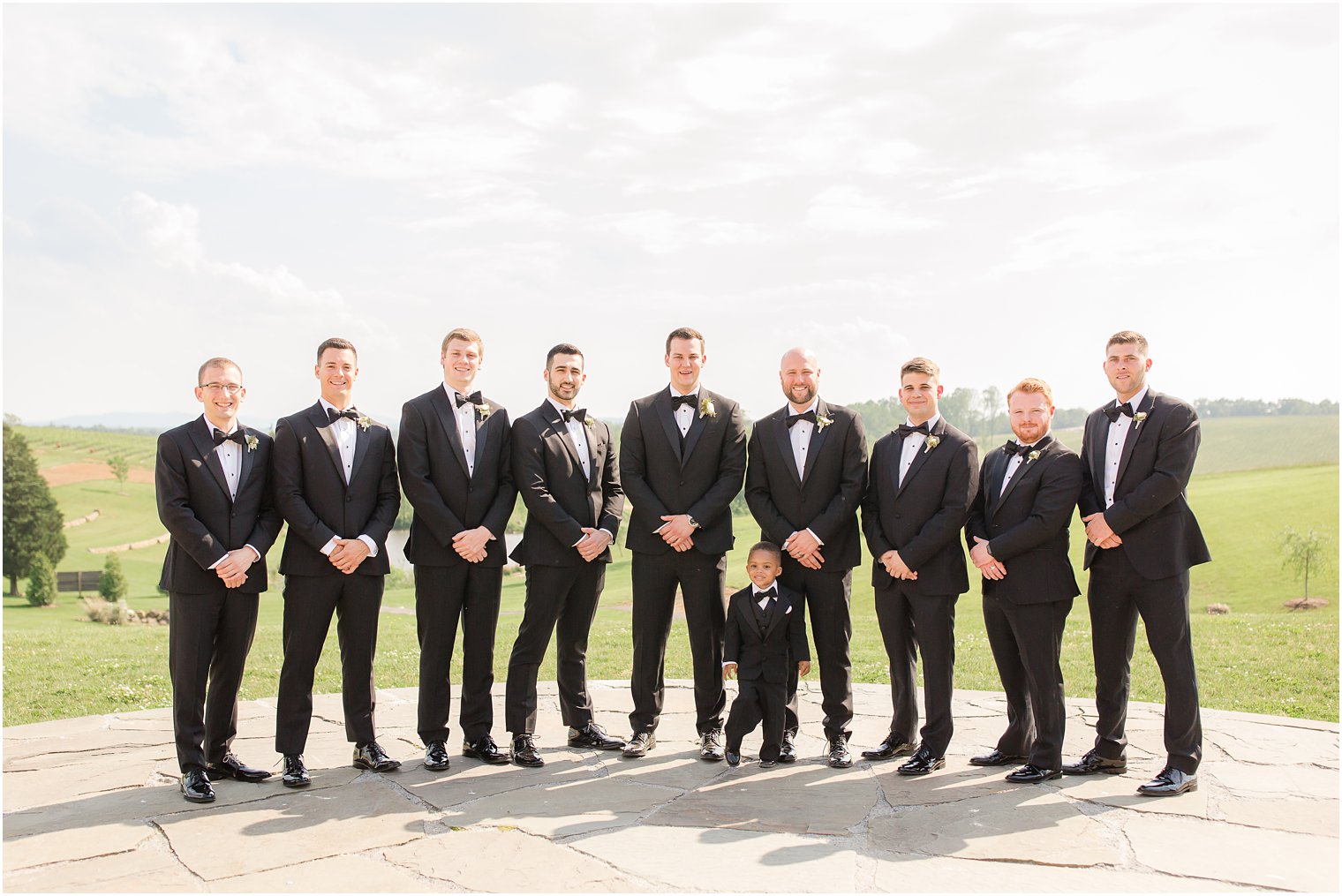 Classic groomsmen shot in black tuxedos