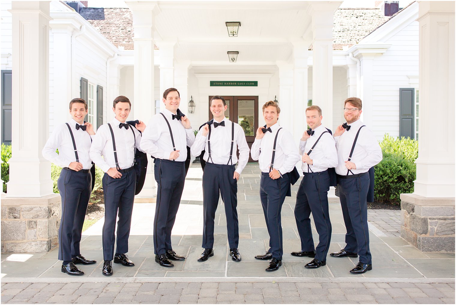 Groomsmen photo with suspenders