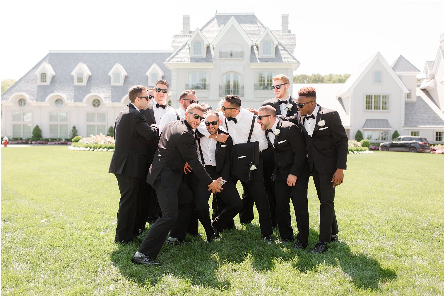 Candid groomsmen photo at Park Chateau Estate