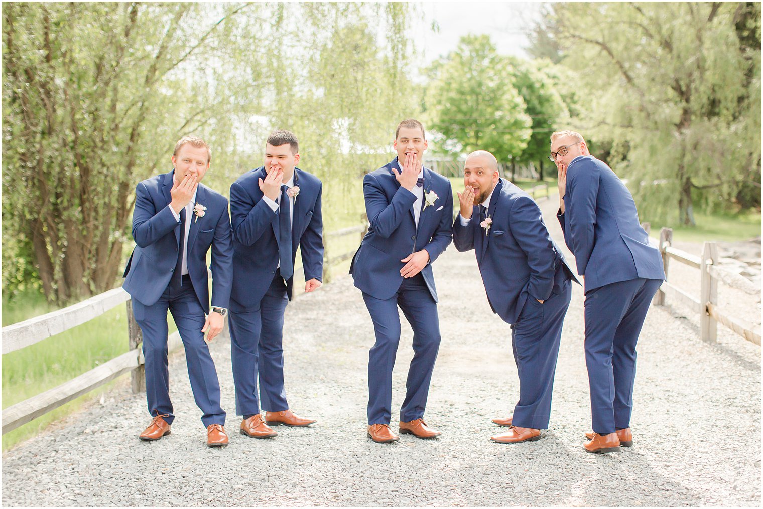 Silly groomsmen photo at Windows on the Water at Frogbridge