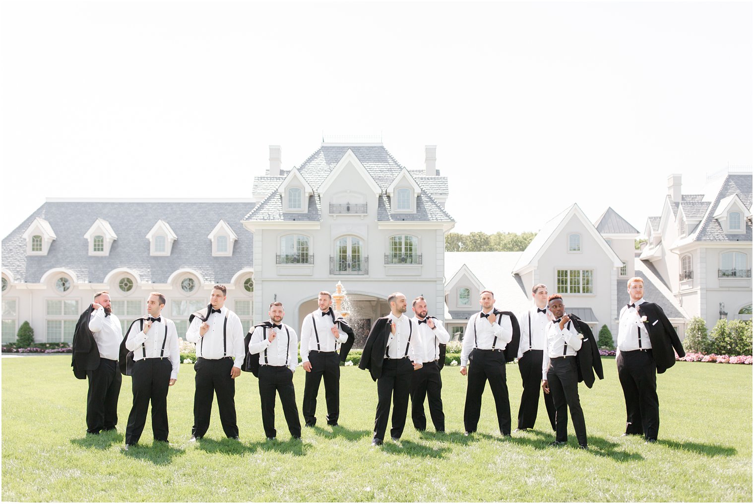 Groomsmen wearing tuxedos | Biracial Wedding at Park Chateau Estate
