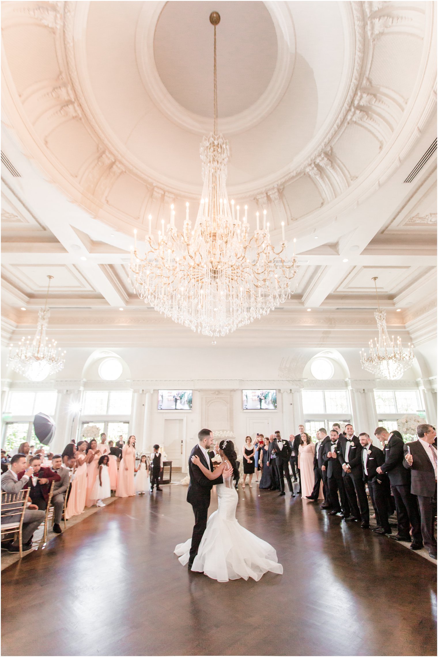 Bride and groom dancing in ballroom at Park Chateau Estate