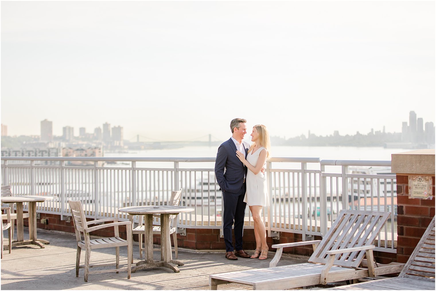 Engaged couple at Hoboken Rooftop Engagement by Idalia Photography