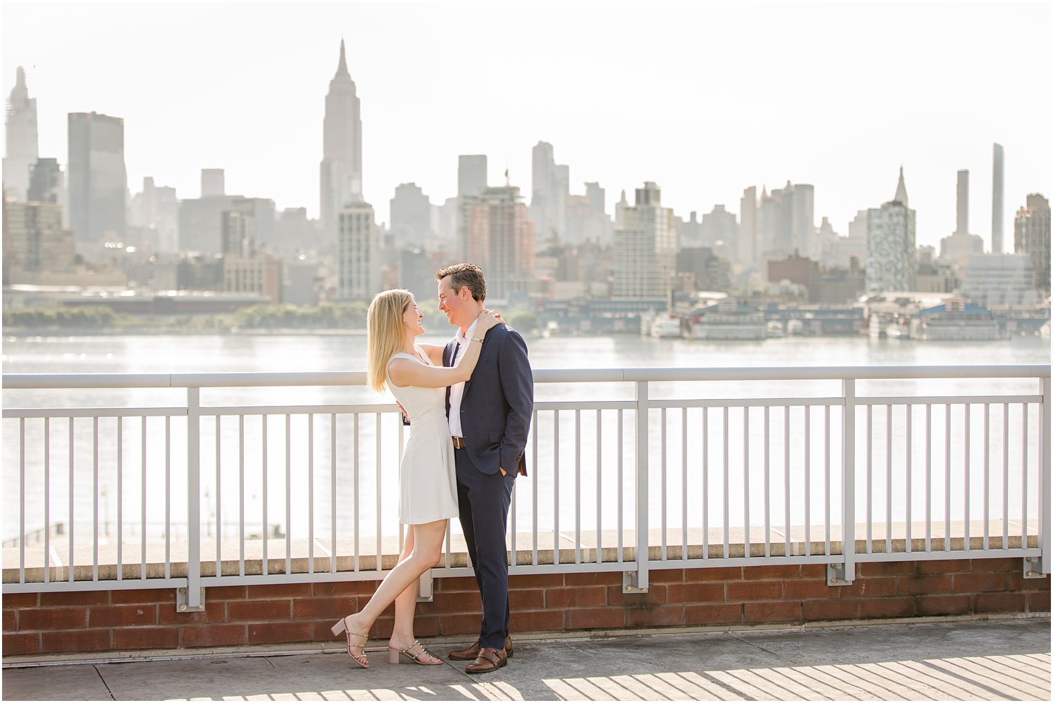 Engaged couple on a rooftop | Hoboken Rooftop Engagement by Idalia Photography