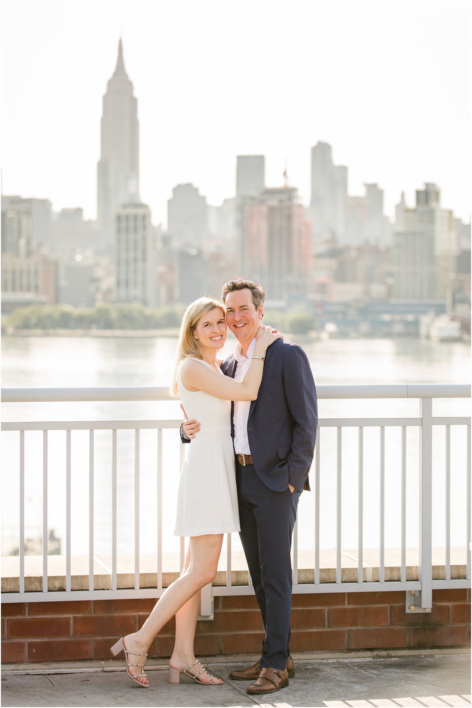 Couple with NYC in the background | Hoboken Rooftop Engagement by Idalia Photography