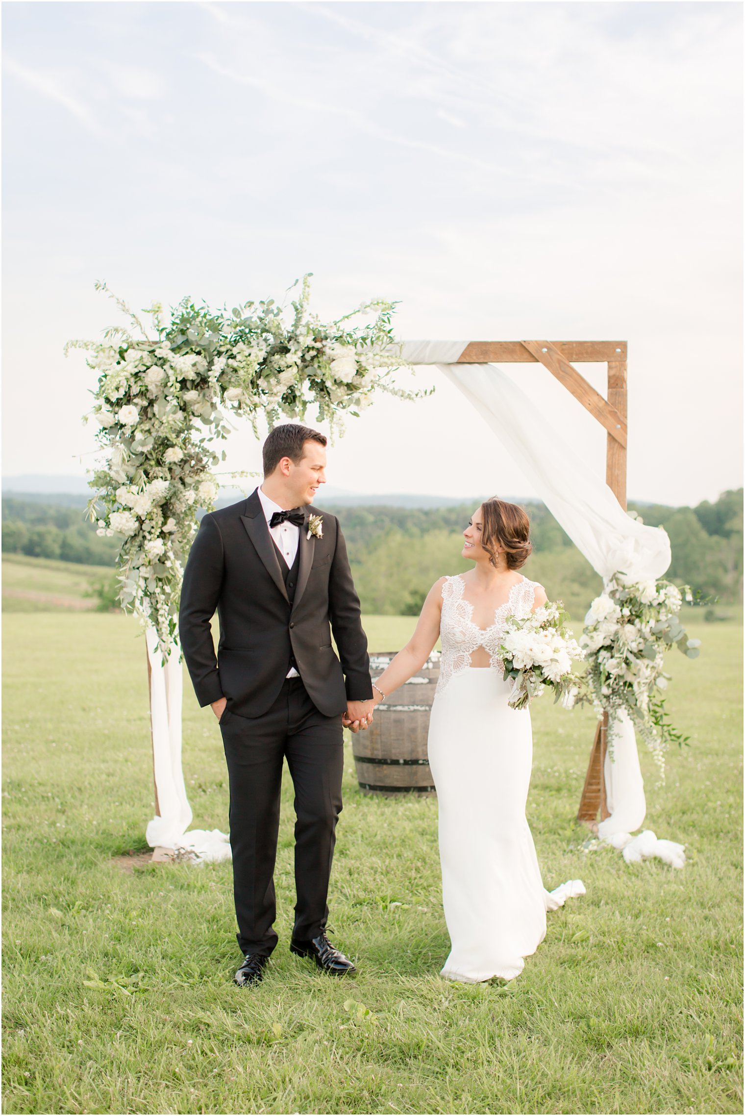 Wedding ceremony at Stone Tower Winery | Florals by Holly Chapple