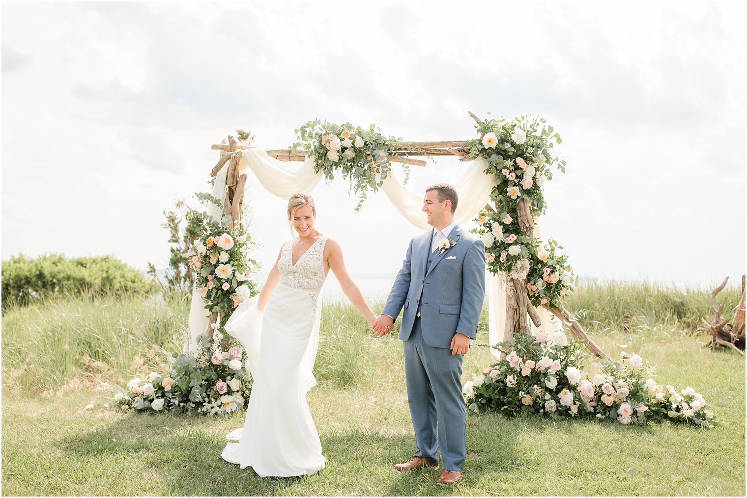 Floral installation by Faye and Renee Floral and Event Design | Wedding at Sandy Hook Chapel