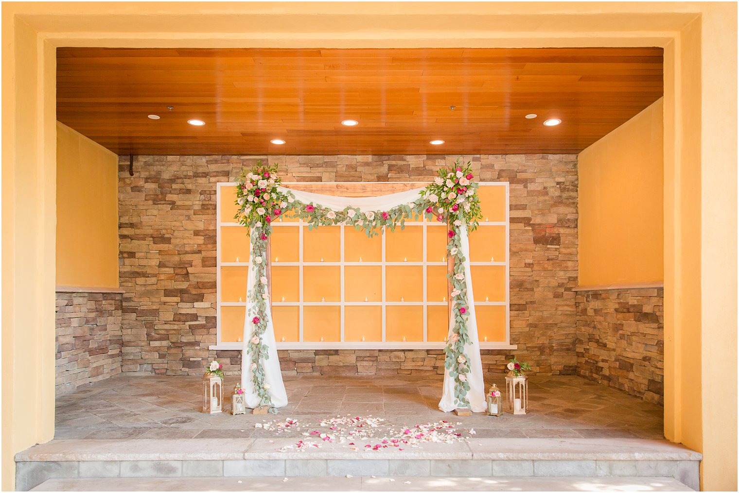 Ceremony arch by Pink Dahlia Floral and Event Design