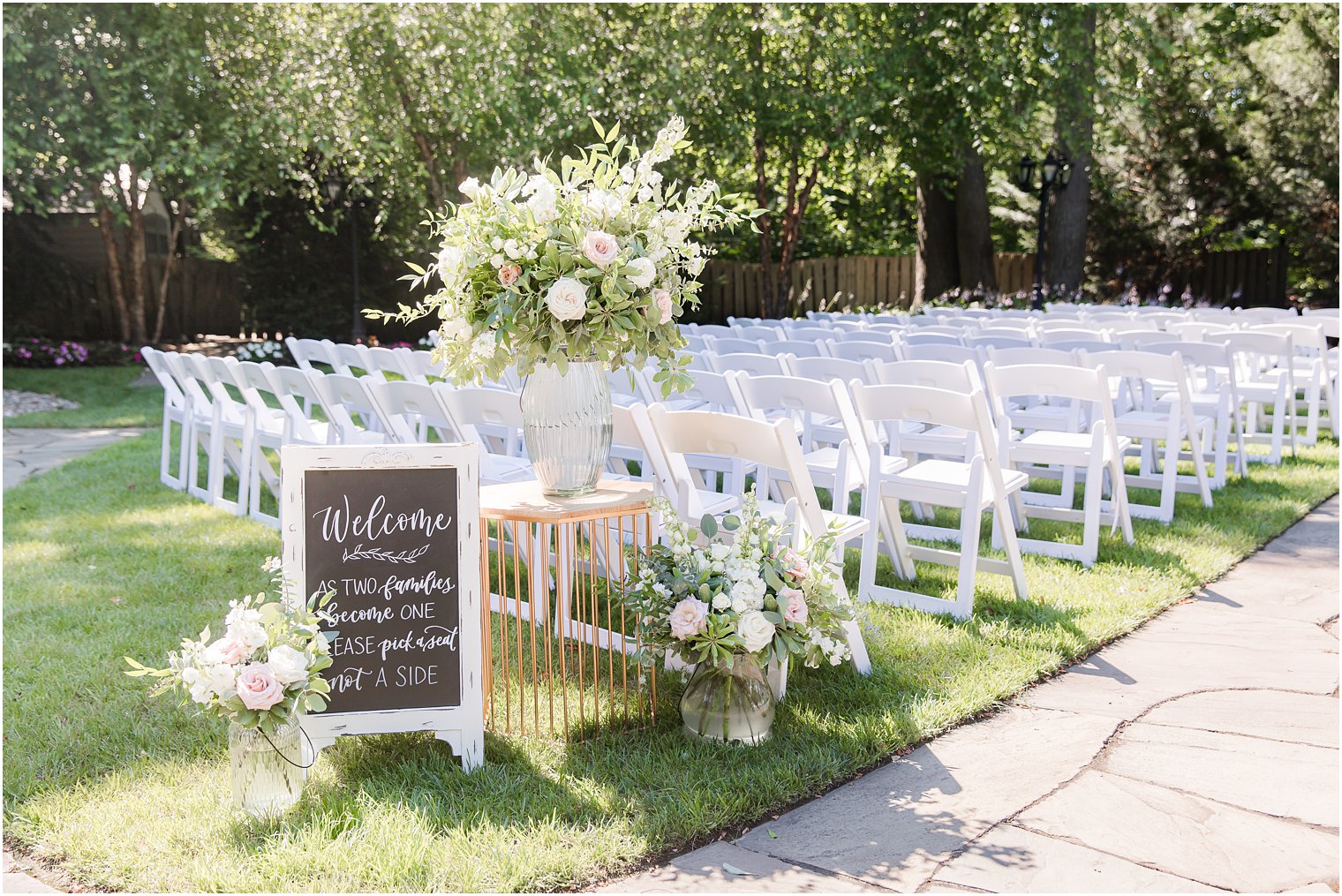 Welcome sign with florals by Eastlin Florals