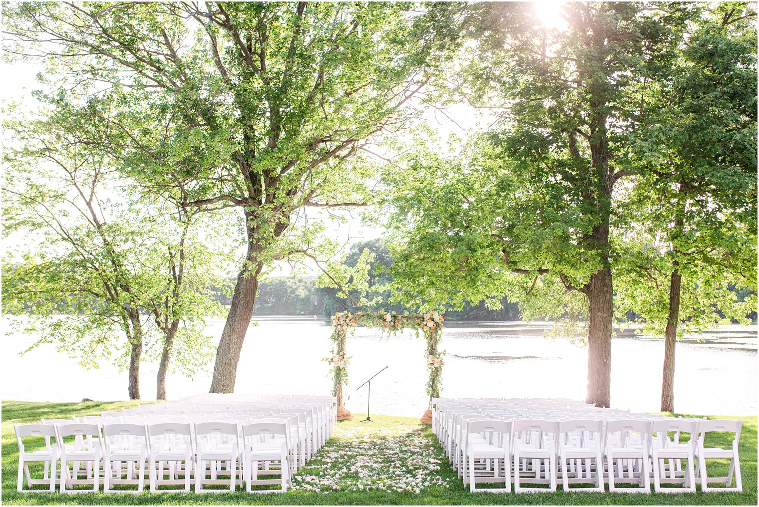 Wedding ceremony florals by Laurelwood Designs at Indian Trail Club