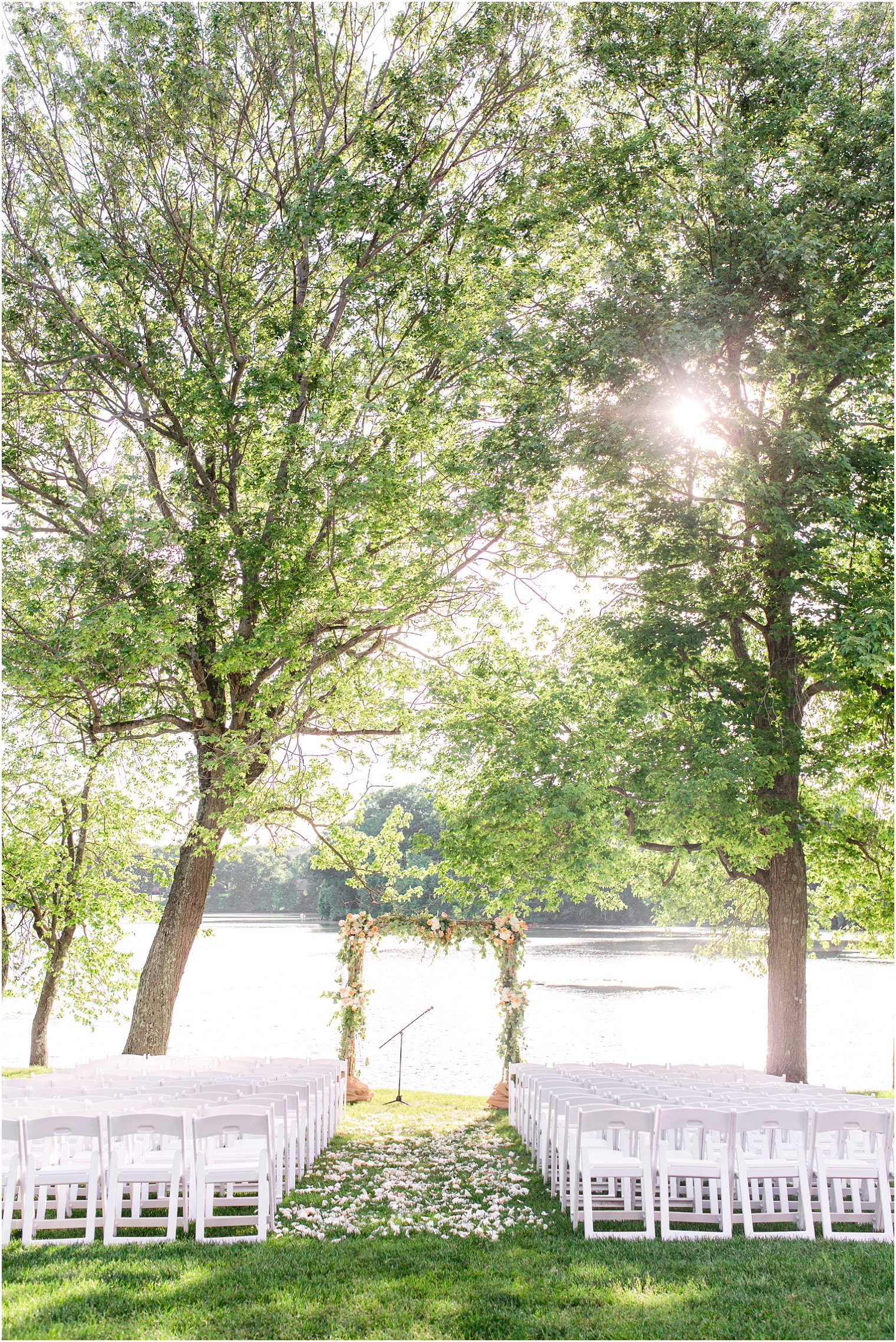 Wedding ceremony florals by Laurelwood Designs at Indian Trail Club