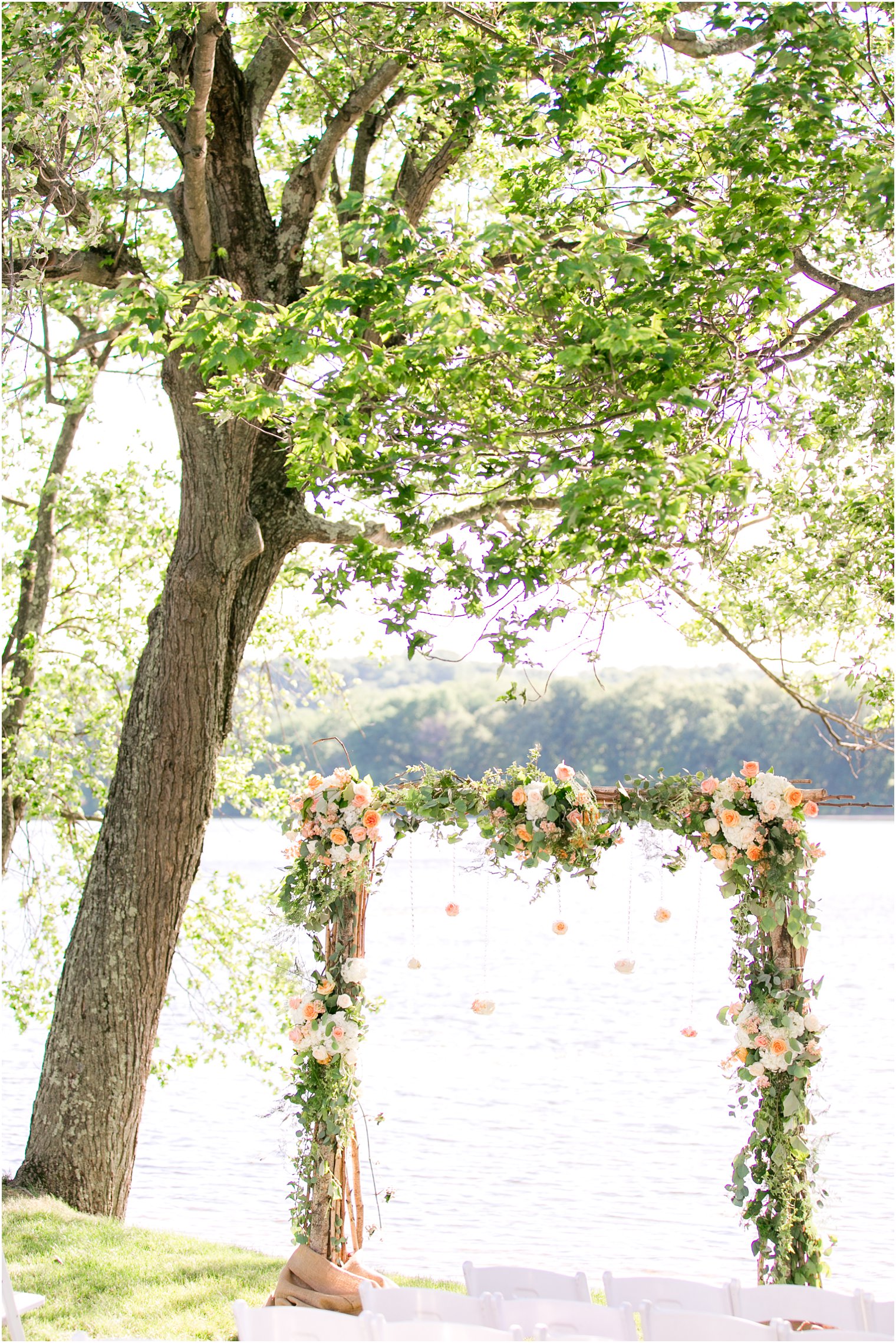 Wedding ceremony florals by Laurelwood Designs at Indian Trail Club