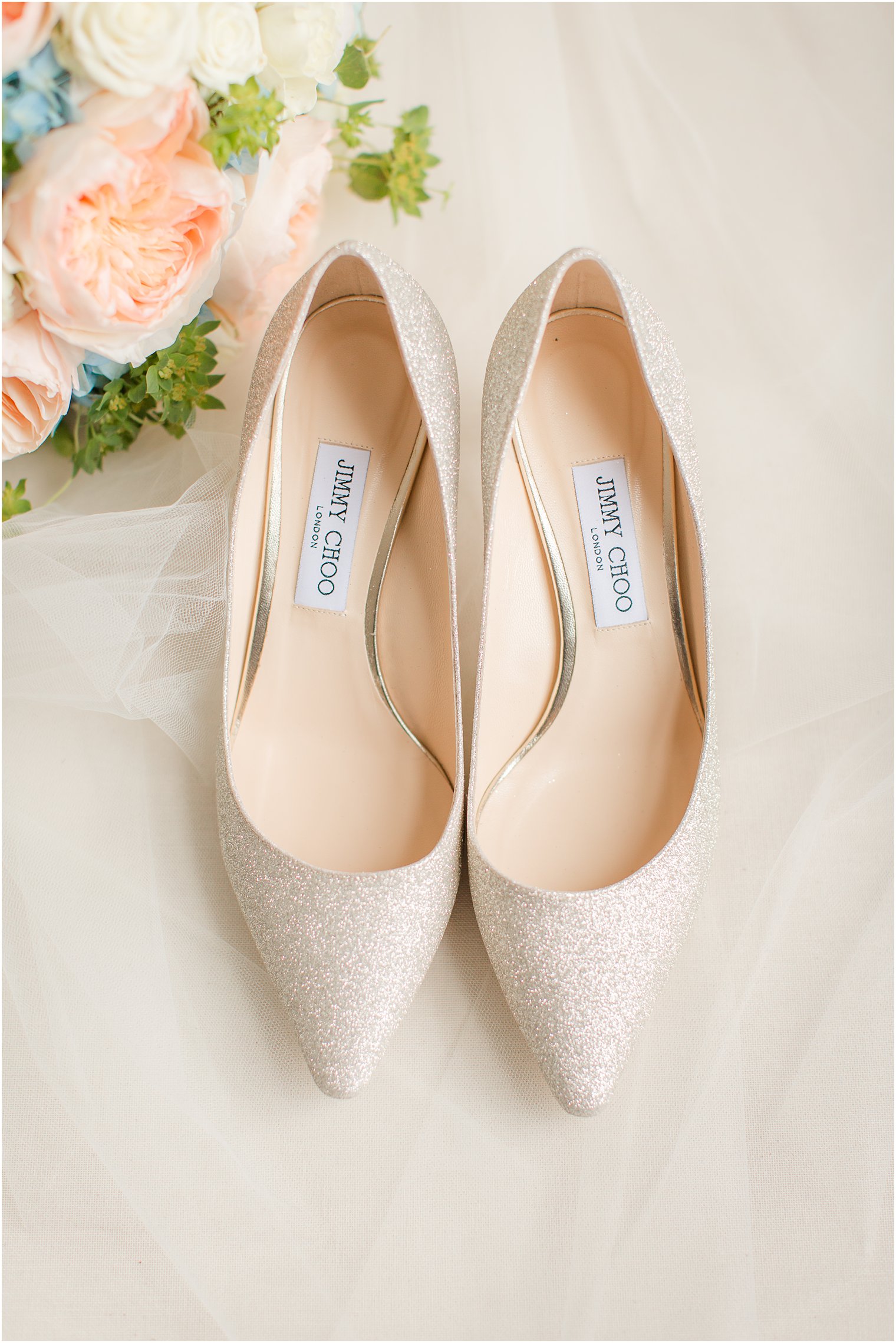 Jimmy Choo gold pumps