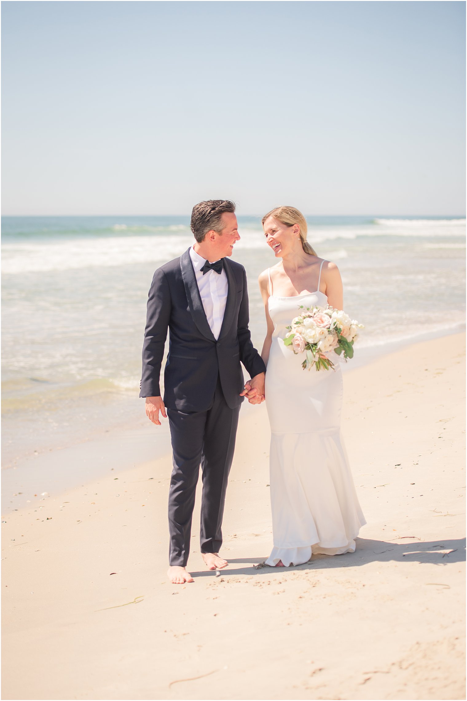 Bride and groom photos on the beach on LBI