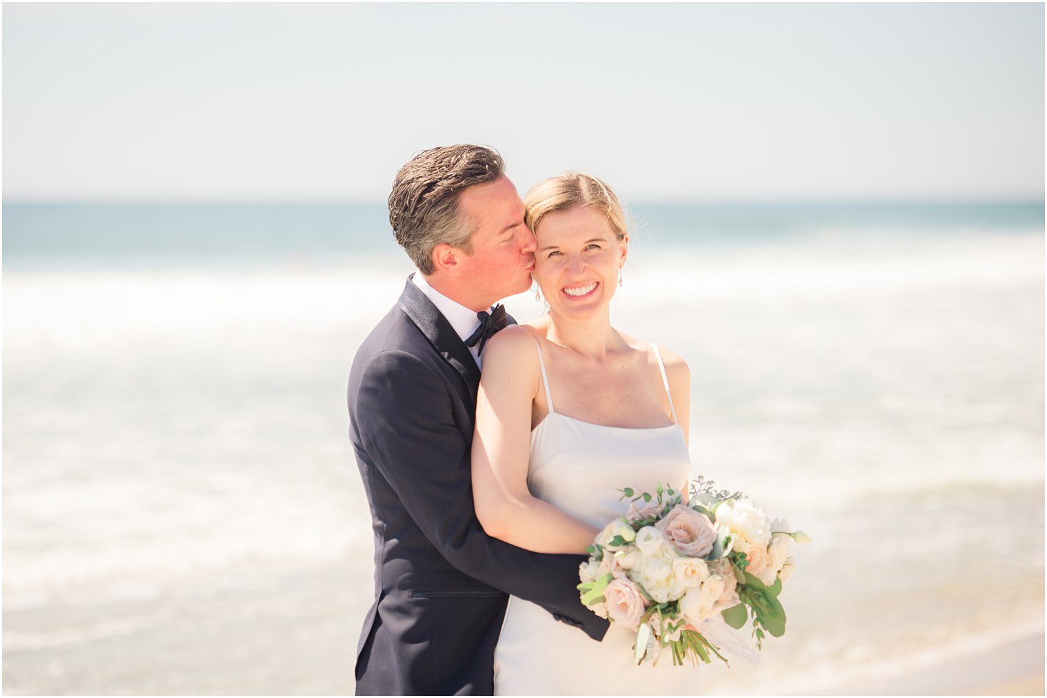 Bride and groom photos on the beach on LBI