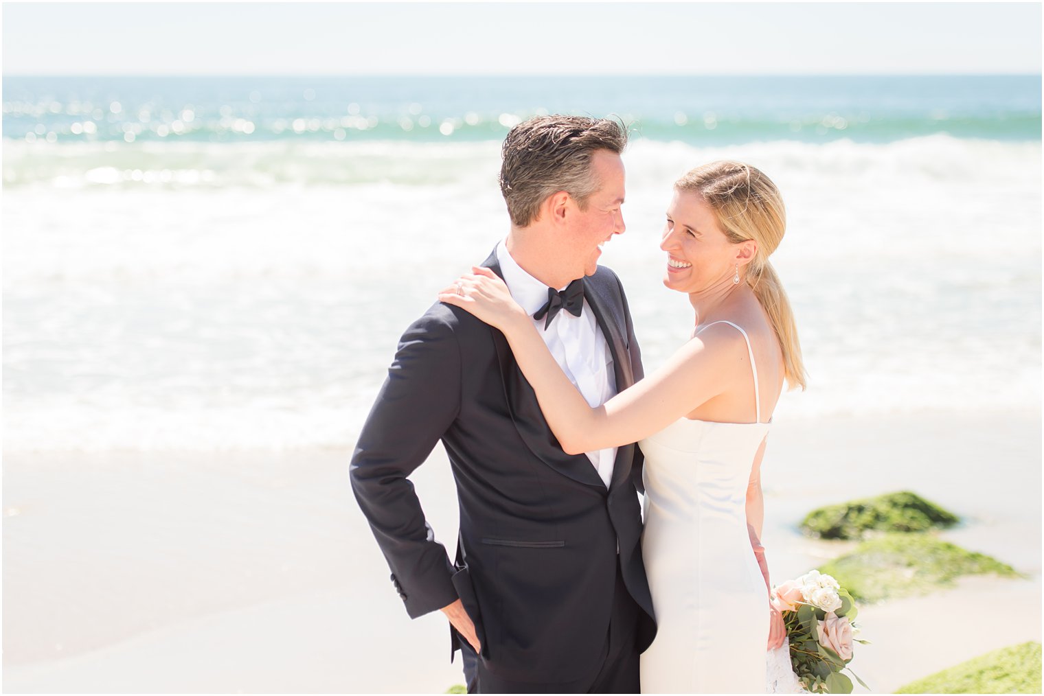 Bride and groom photos on the beach on LBI