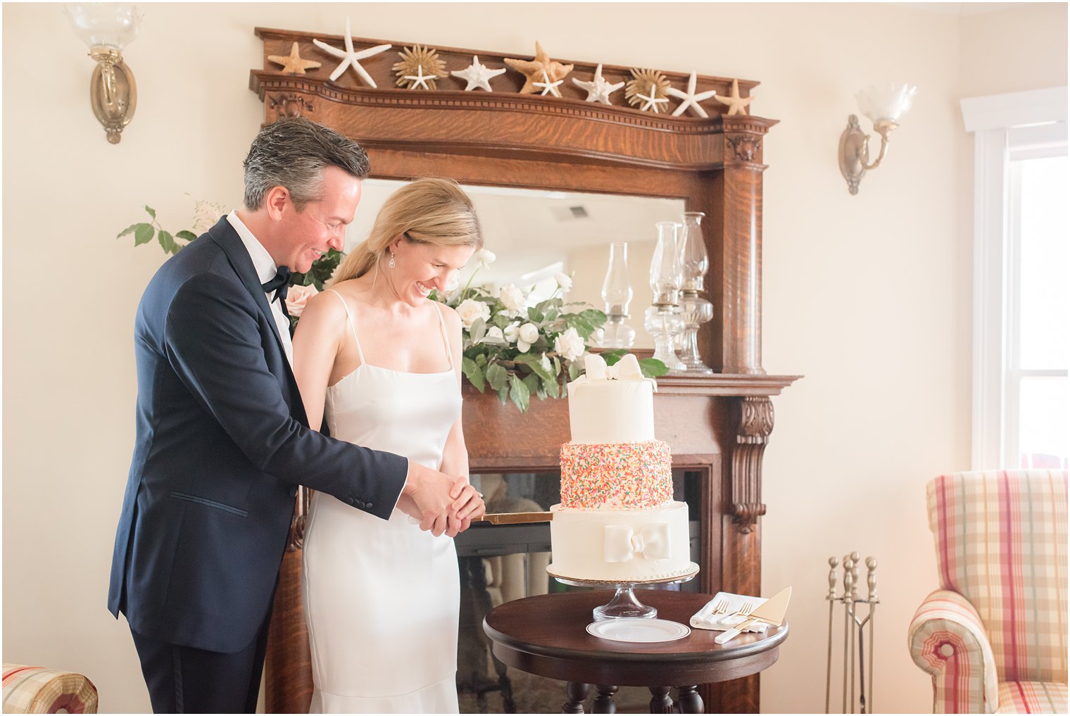 Bride and groom cutting their wedding cake on LBI