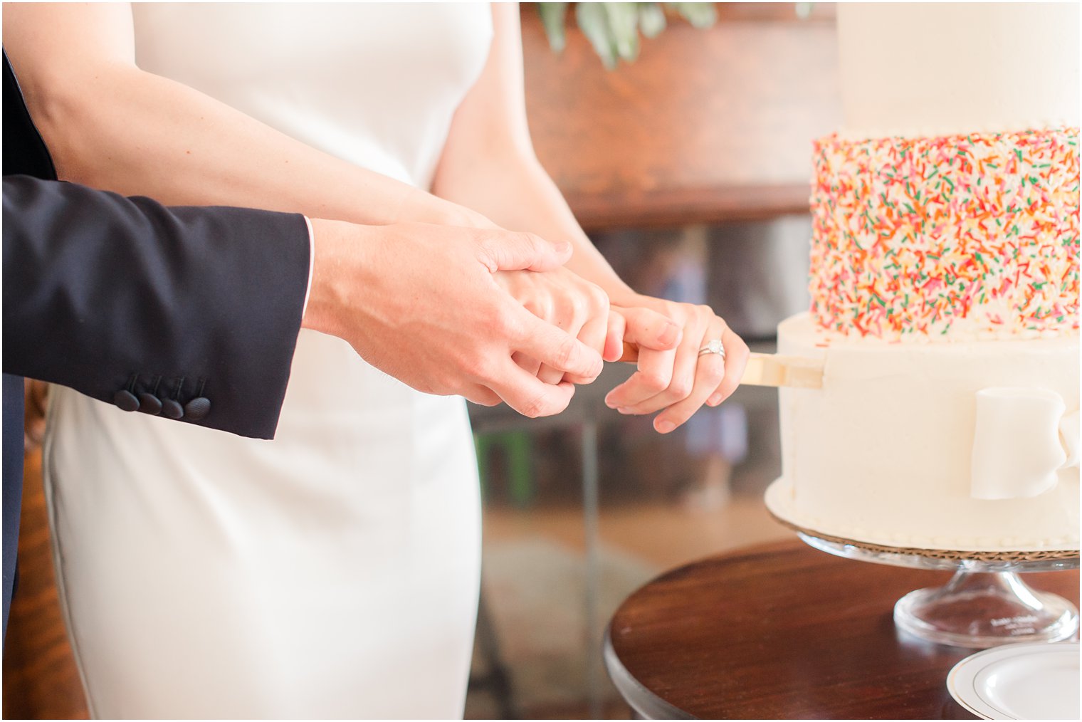 Bride and groom cutting their wedding cake on LBI