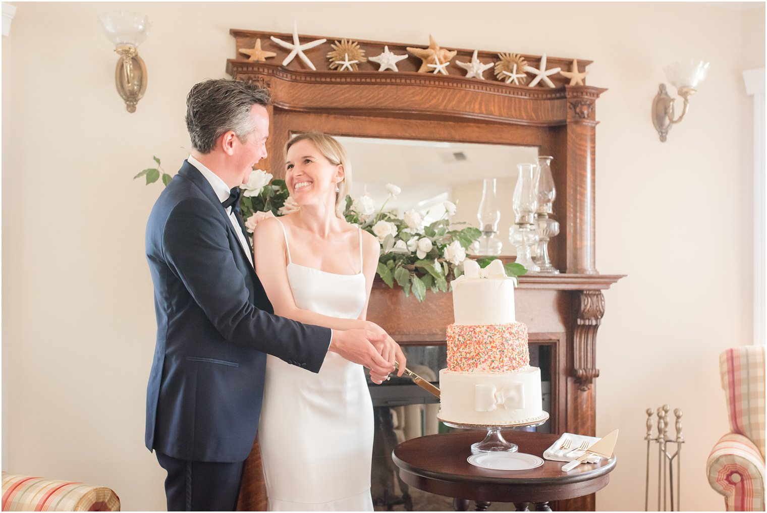 Bride and groom cutting their wedding cake on LBI