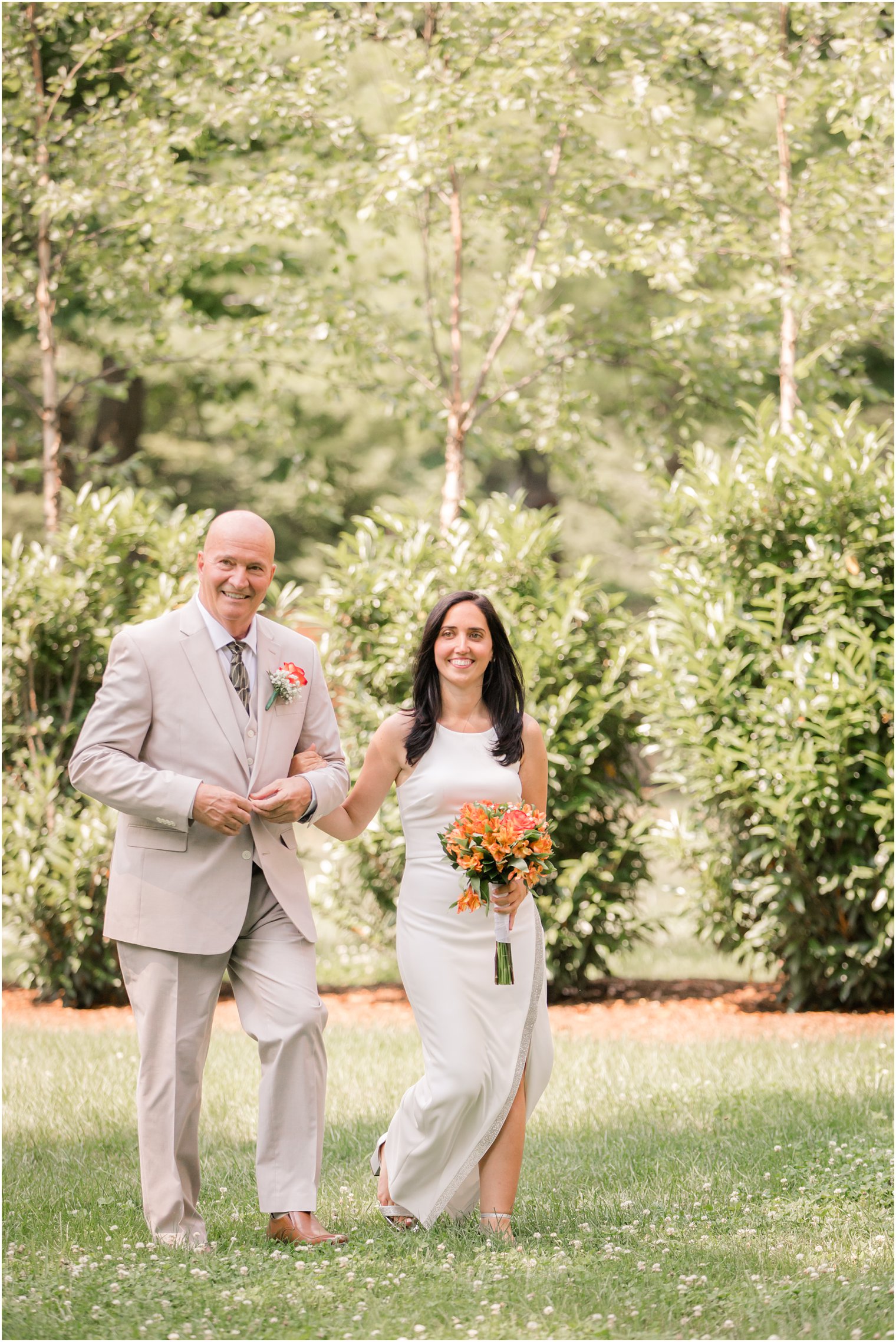 Father of the bride walking bride down the aisle