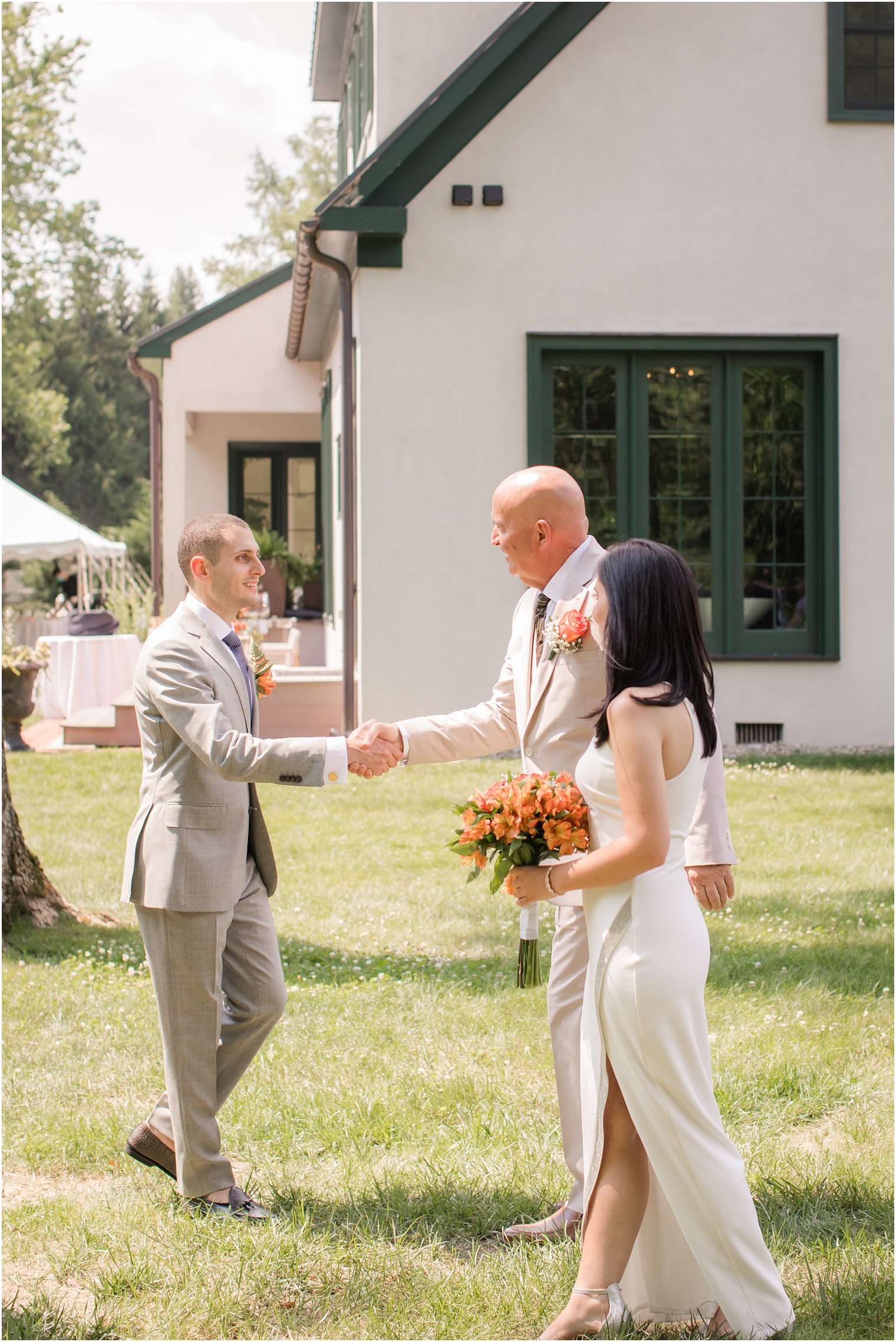 Father giving away his daughter in intimate wedding ceremony