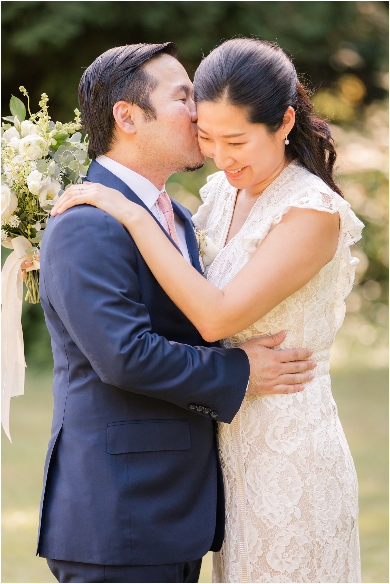Candid moment between bride and groom | NJ Intimate Wedding with a Gorgeous Arch by Idalia Photography