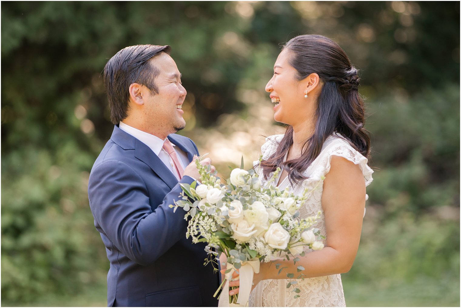 Bride and groom laughing