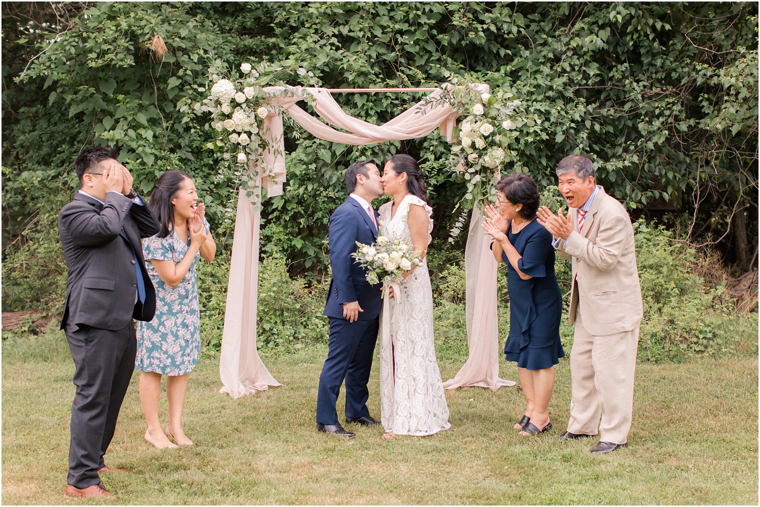 Cute family photo after intimate wedding