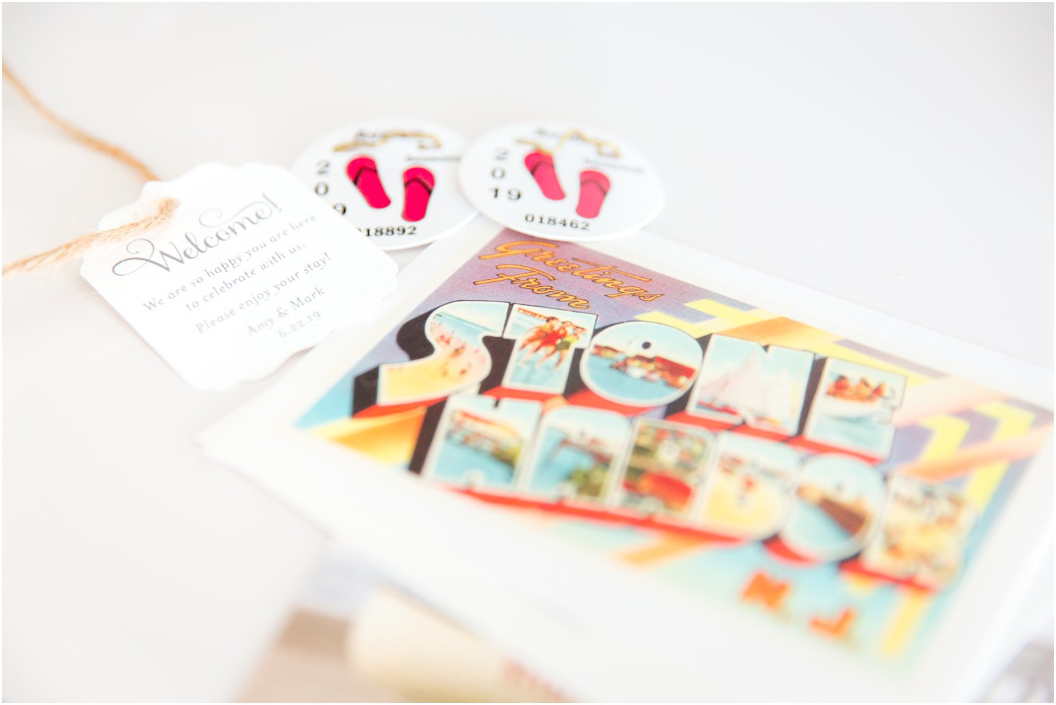 Wedding welcome bag with postcards and beach badges