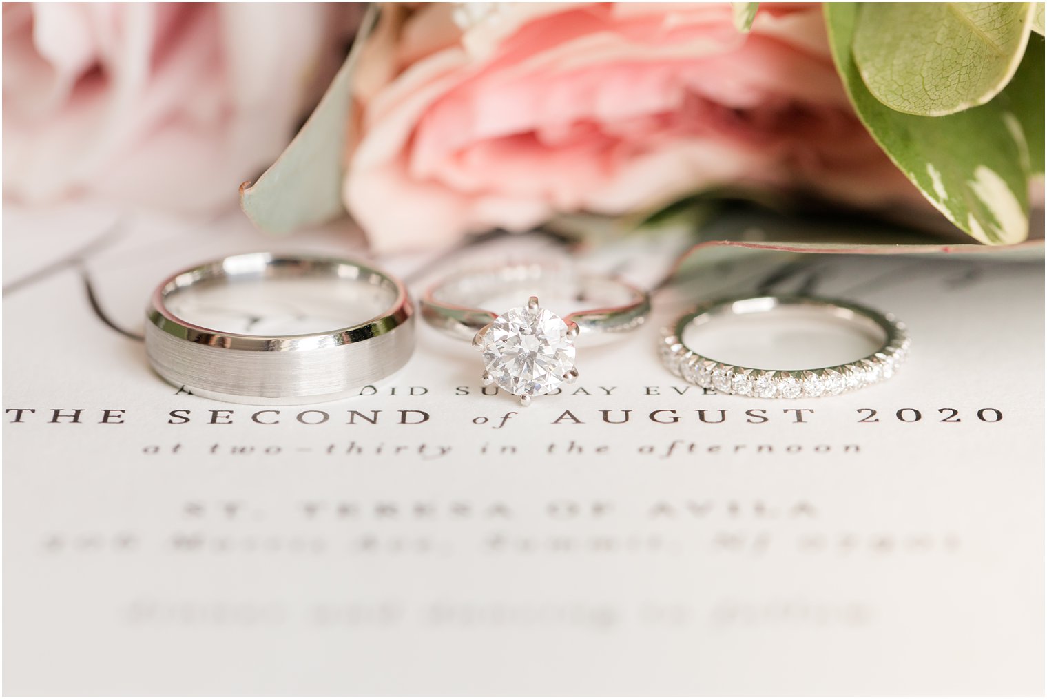 Wedding bands on wedding invitation