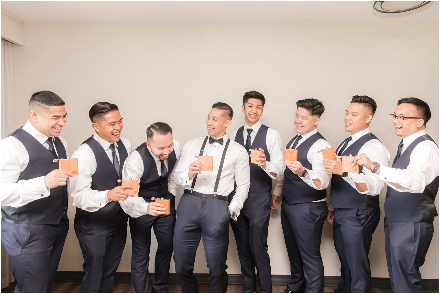 Groomsmen photos with monogrammed flasks