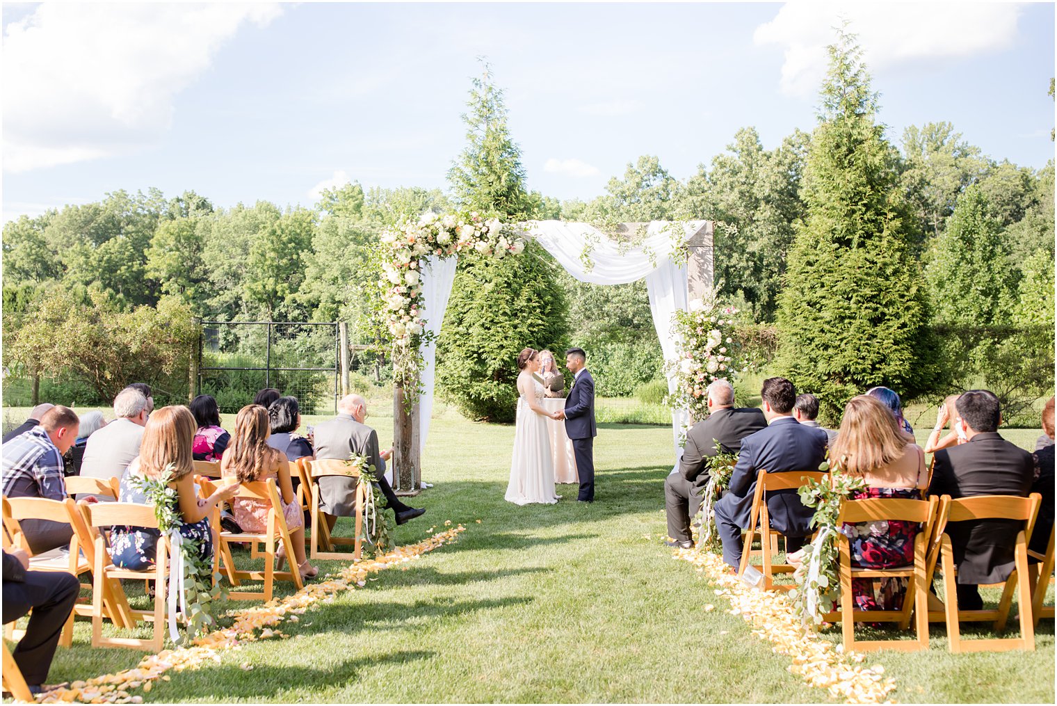 Outdoor wedding ceremony at Ninety Acres at Natirar in Peapack NJ