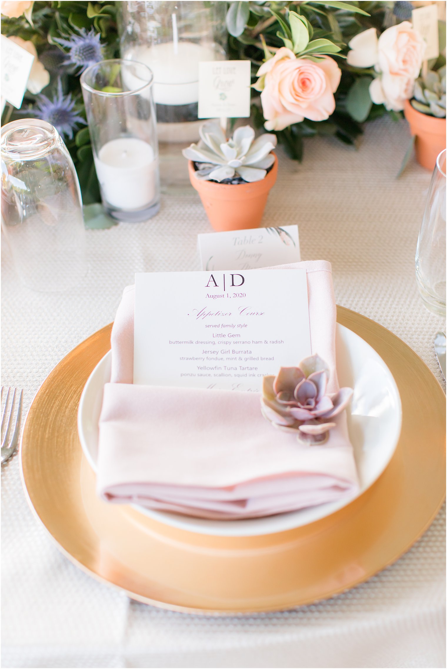 Custom menus with eucalyptus seating cards