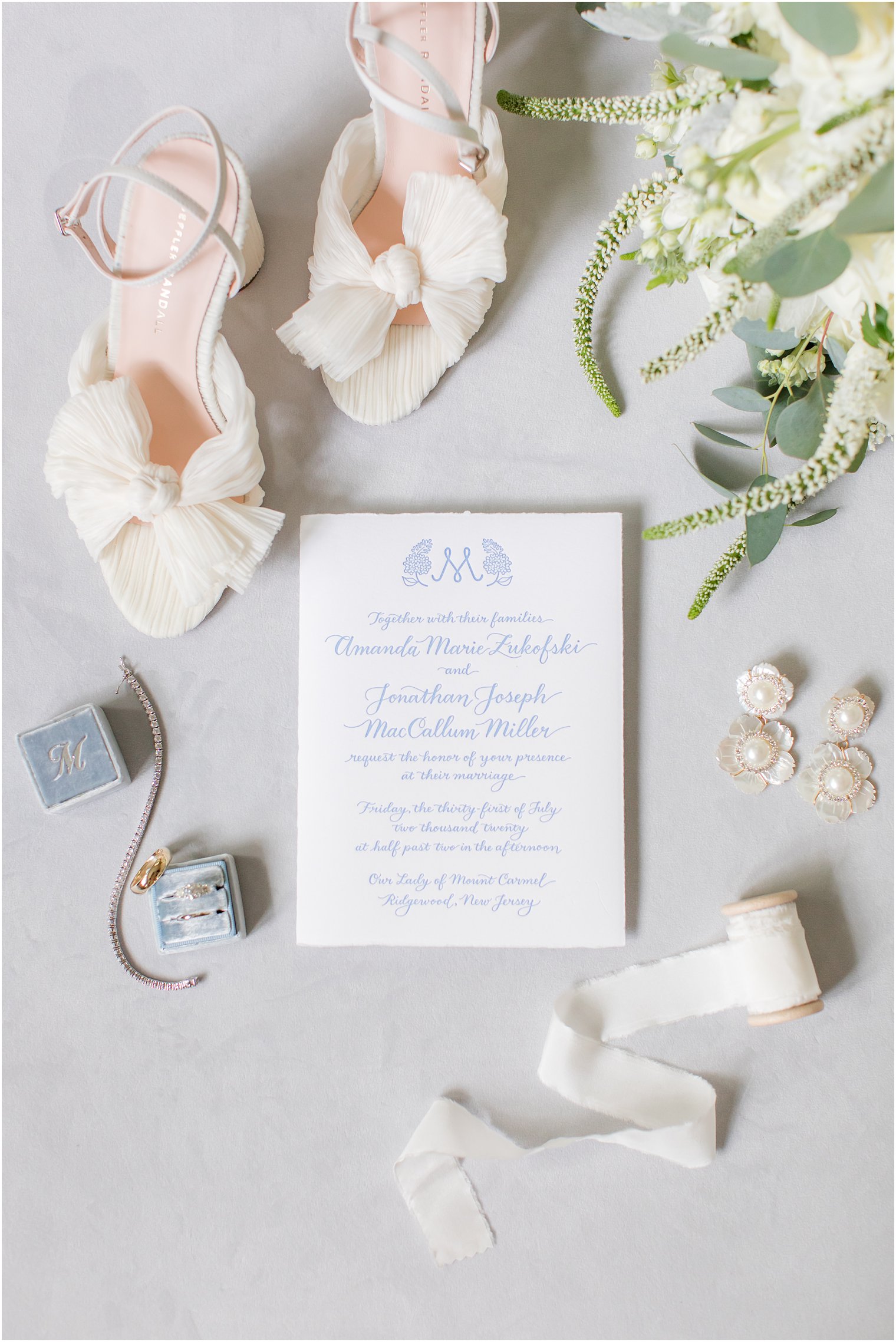 Letterpress invitations with blue writing
