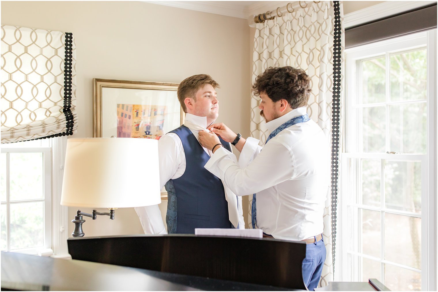 groom getting ready with best man