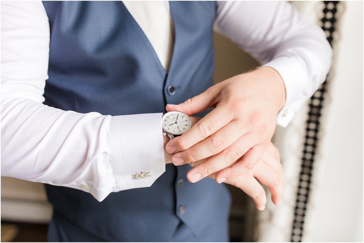 groom putting on his watch