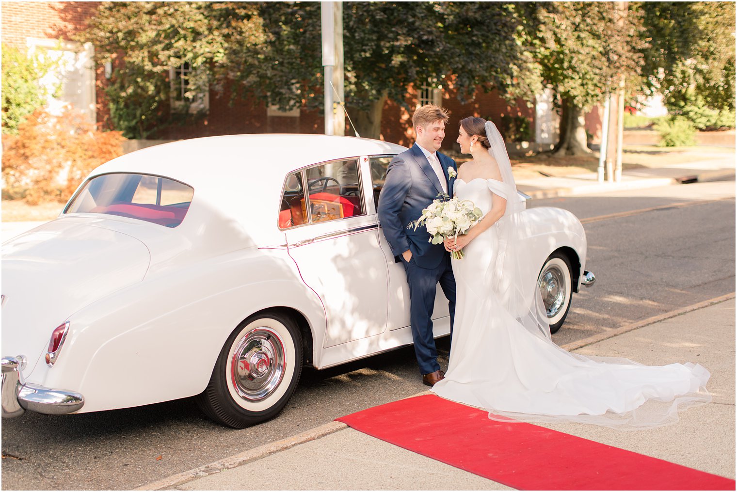 bride and groom toasting after wedding ceremony at Our Lady of Mount Carmel in Ridgewood NJ