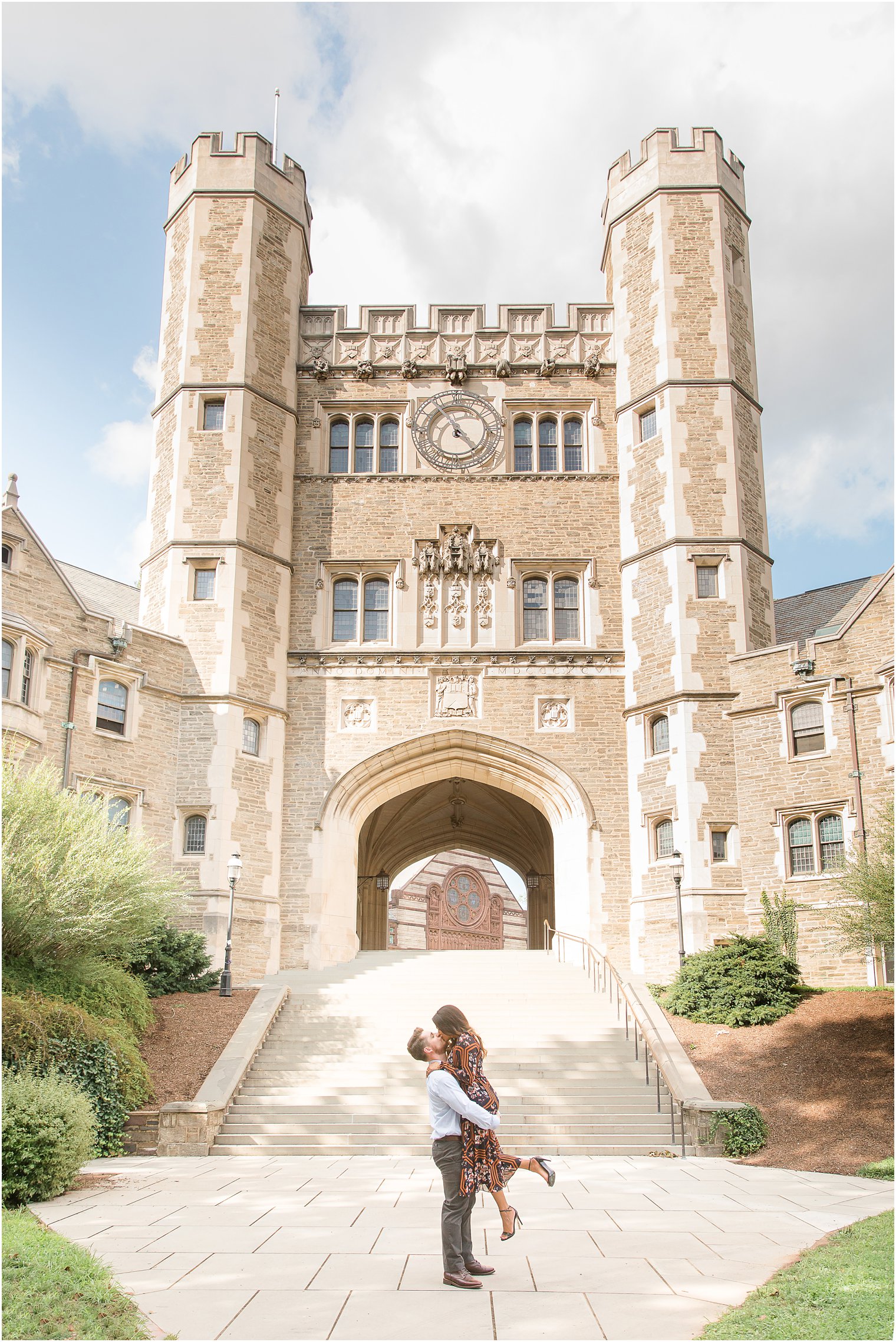 Groom lifting bride at Princeton University Engagement Session