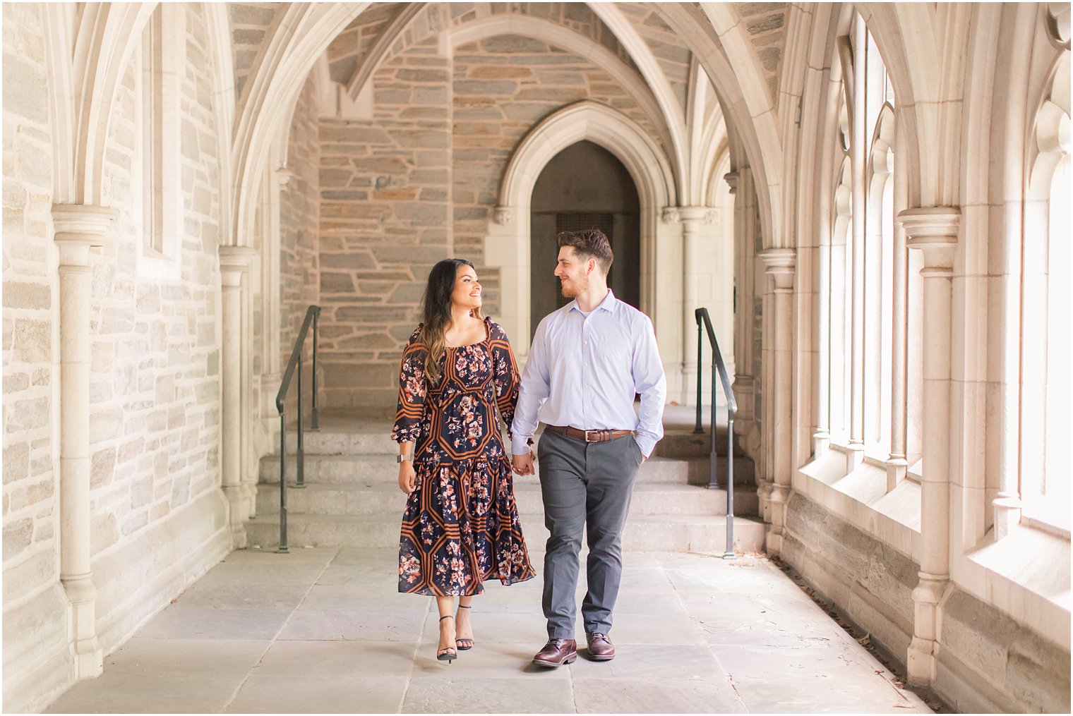 Bride and groom walking in campus building