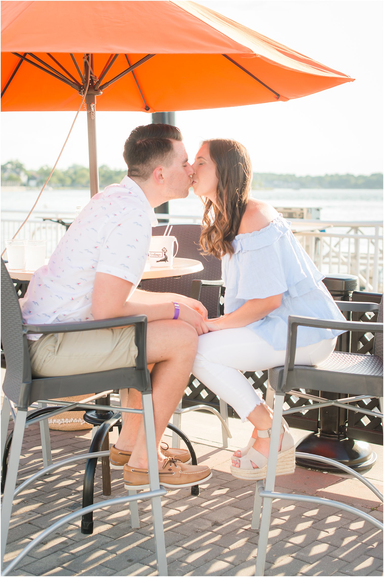 NJ couple kisses during Jersey Shore engagement photos