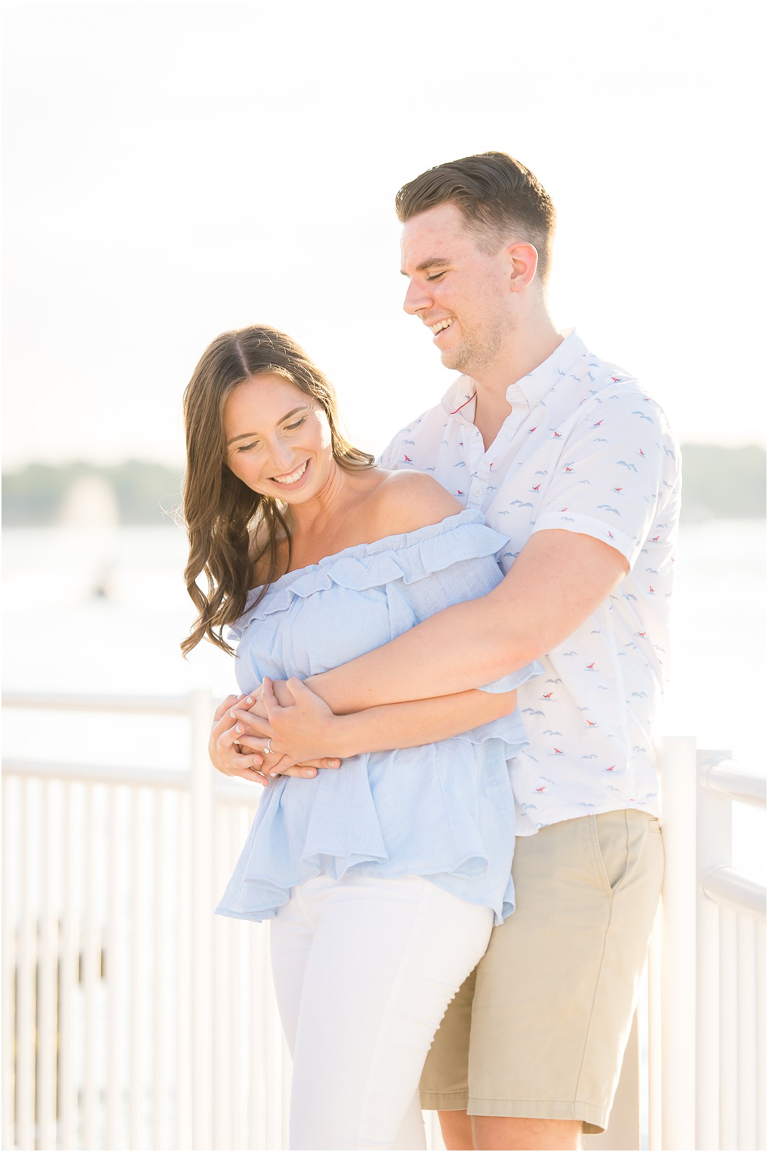 sunset Belmar NJ Engagement Session with couple in beach inspired outfits