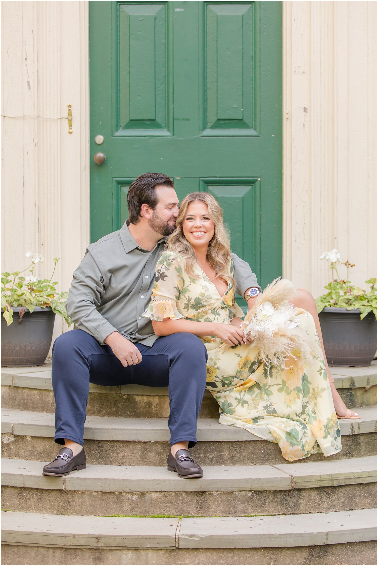 romantic summer engagement session in front of green door