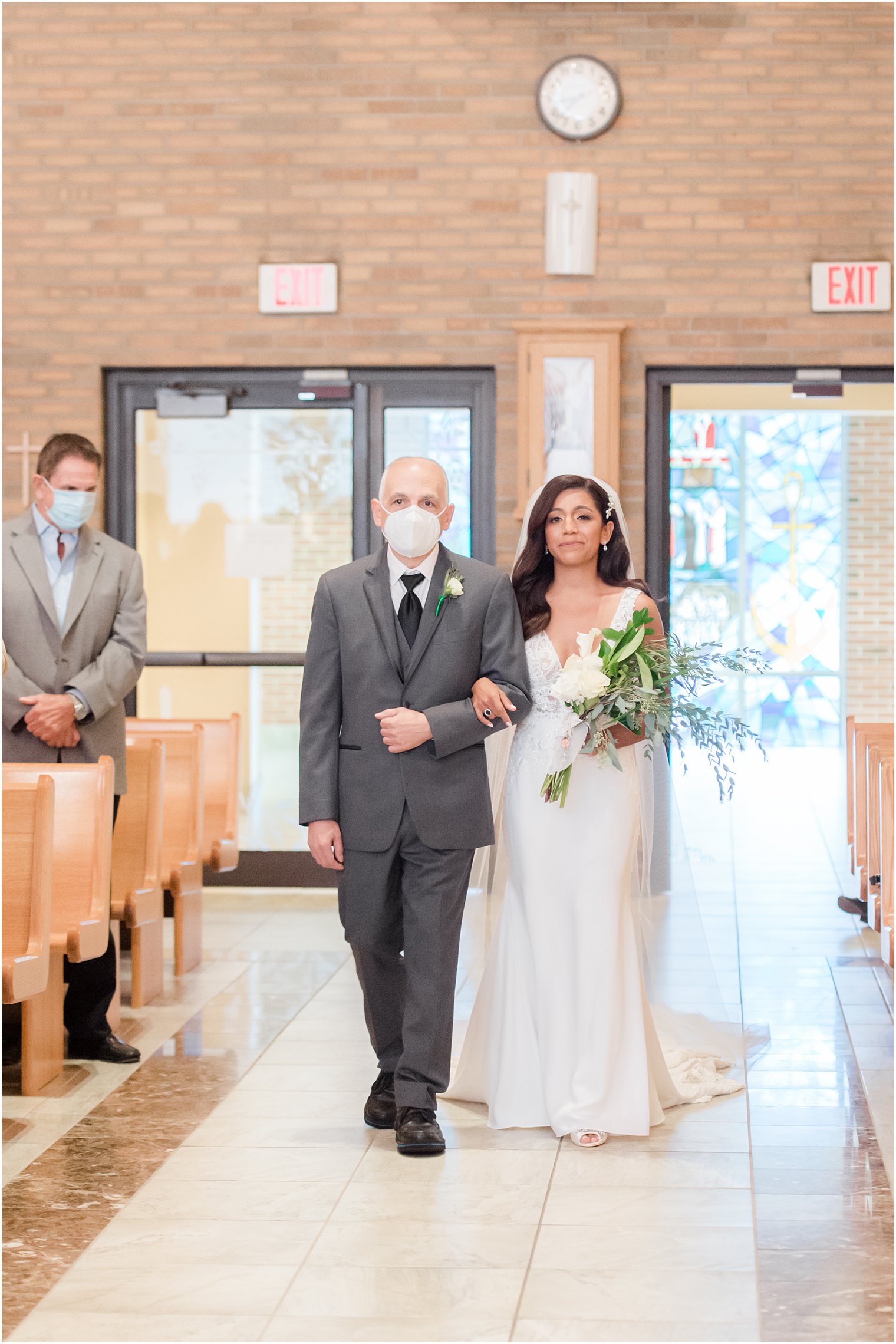 bride and father walk down aisle at traditional Toms River NJ church wedding