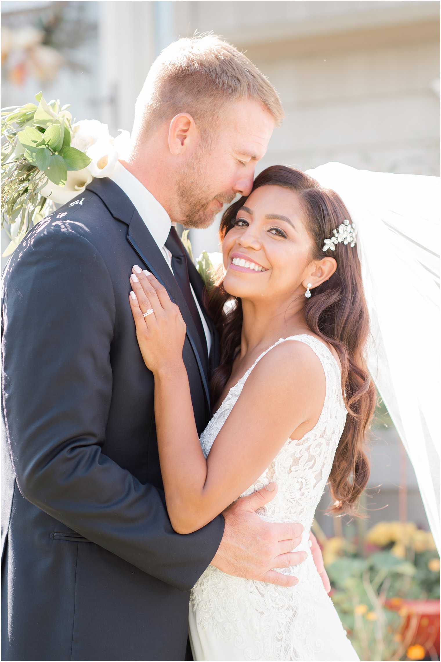 newlyweds pose in Tom's River garden